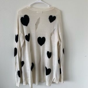 White cardigan with hearts